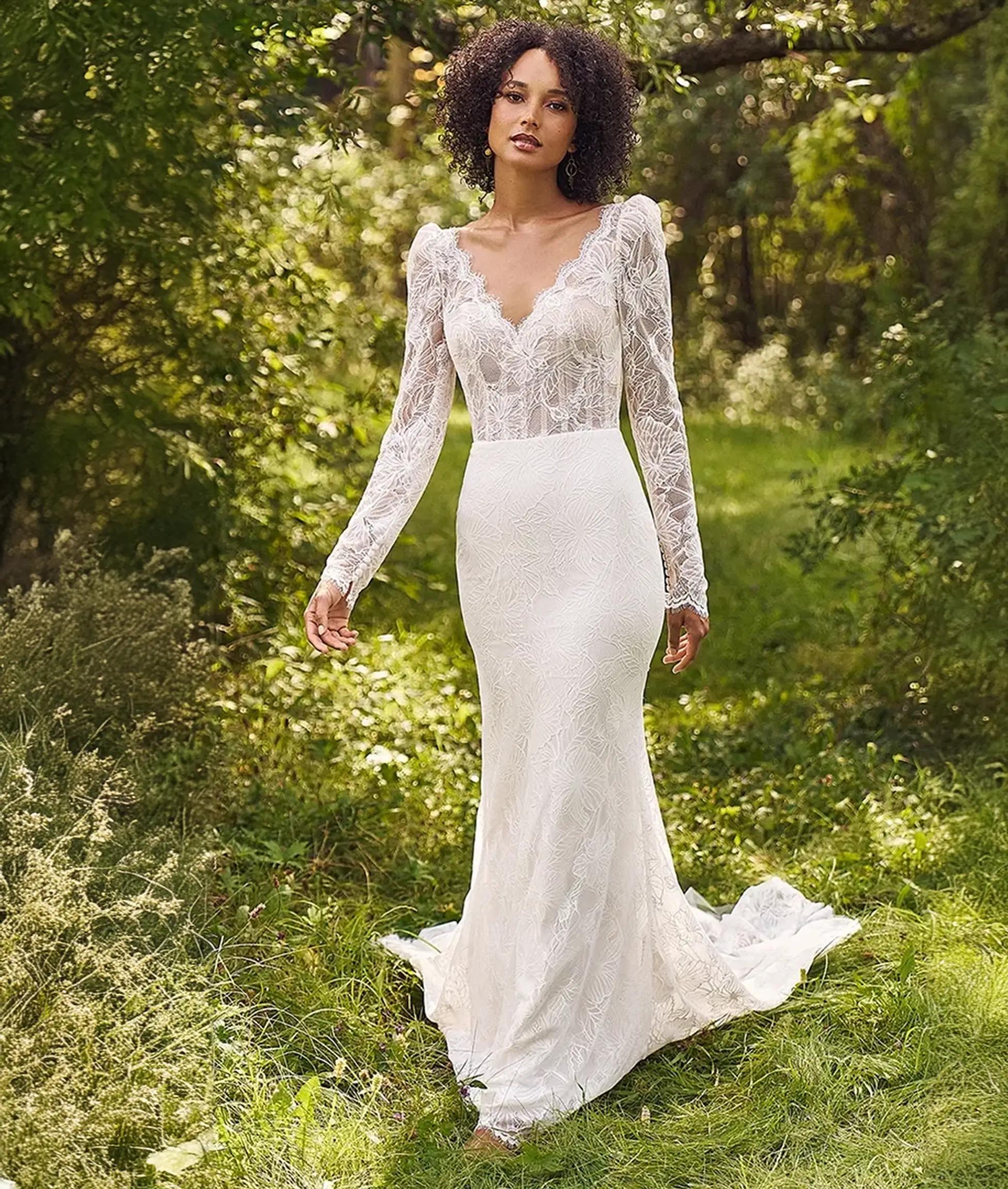 Model wearing white Allure Bridalwear dress